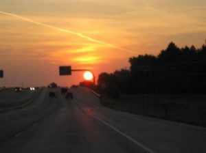 best dog blog, champion of my heart, sunrise photo with highway in the foreground