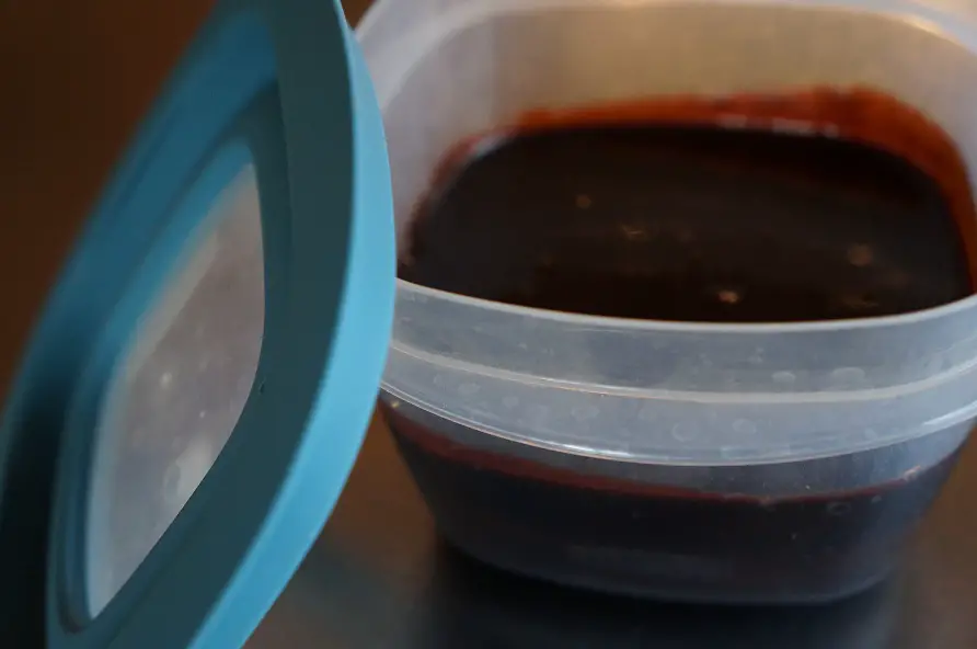 I originally found this homemade hot fudge sauce recipe from a quick online search, but it wasn't turning out quite right. I turned to a great Facebook Group led by a friend, colleague, and mentor called Fearless Fresh Kitchen Ninjas. Thanks to their fast and expert input, I fixed my errors and updated the recipe so that it's nearly flawless. For better or worse, it has become my go-to comfort food (over quality vanilla ice cream) for several months now. I have the extra pounds to show for it, so be careful. But, if you stressed and in need of gooey homemade hot fudge sauce, get ready to dazzle yourself. It's that good. (And easy to make ... step-by-step pix just ahead). Stress-Busting Homemade Hot Fudge Sauce 1/3 cup milk 1/4 cup butter 2 T light corn syrup 1/3 cup cocoa 1 cup sugar 1 t vanilla Dash of salt The mistake I was making is that I stirred everything WAY too much, which makes sauce turn out kind of gritty from sugar crystals. Adding some light corn syrup helps  prevent that problem too, but definitely stir this as little as possible.  To avoid this problem, I now mix in the cocoa to the wet ingredients first so that I can stir that like CRAZY before adding any sugar.  So, it looks like this in the sauce pot that's on the stove over medium heat. Then one that's mixed up and starting to warm, I add the sugar. But, I let it sink in and only stir a tiny bit. Then it looks like this. Just let it warm up over medium heat until it boils. Don't stir! Just wait. Once it's boiling like this, let it boil for 1 minute. After that 1 minute, take the pot off the heat (and turn off the stove), then add the vanilla and salt at the same time, and only stir 2-3 times. More like swishes really, than stirs. You want to let it cool a bit before putting on ice cream. And, even once you pour it on the ice cream, let it sit for a bit ... that's when the chewy texture sets up.  This is a runny fudge-like sauce. It's gooey with real body and texture.  I store any leftovers in an airtight container in the refrigerator