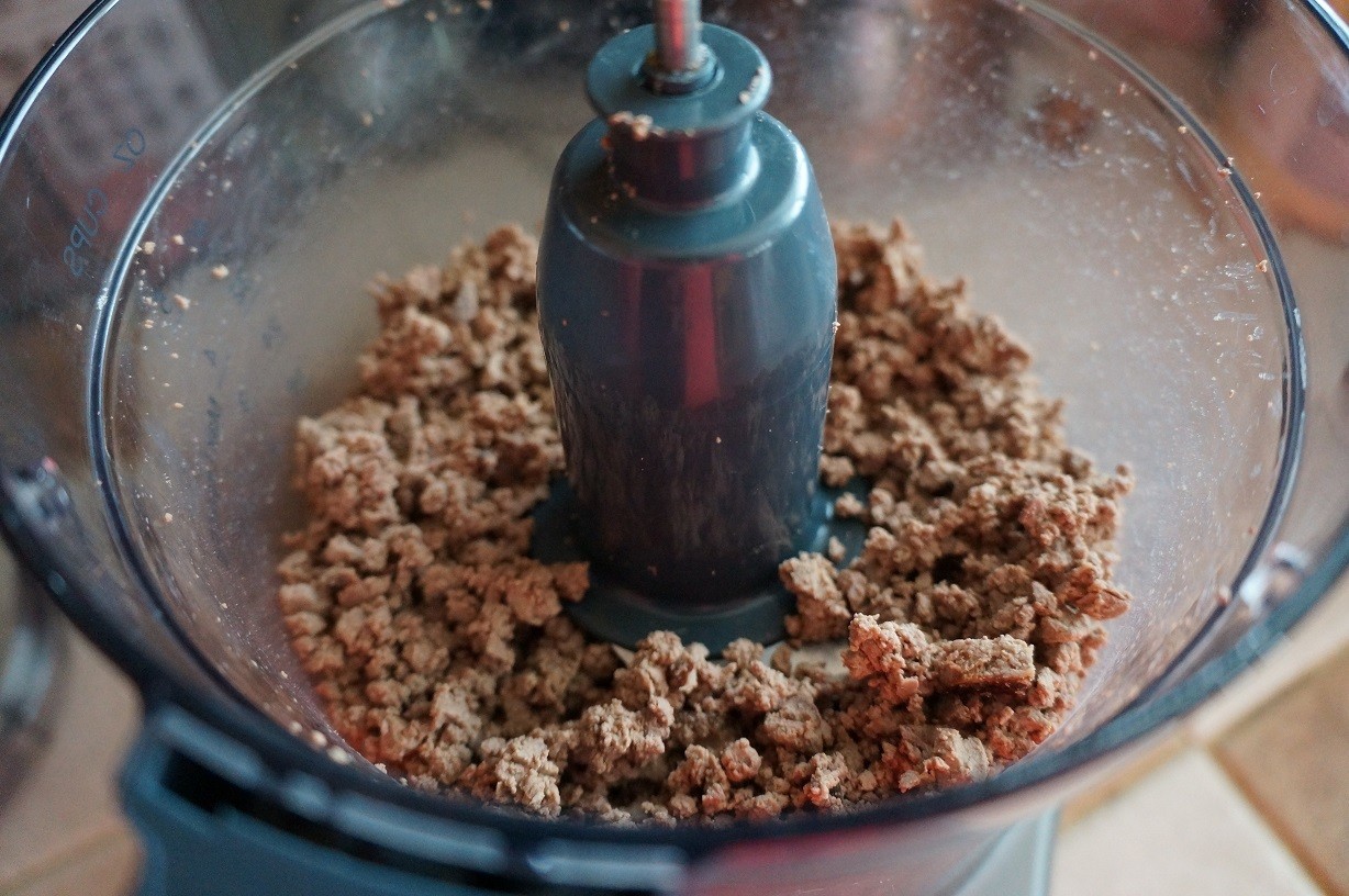 food processor with bits of ground up cooked liver