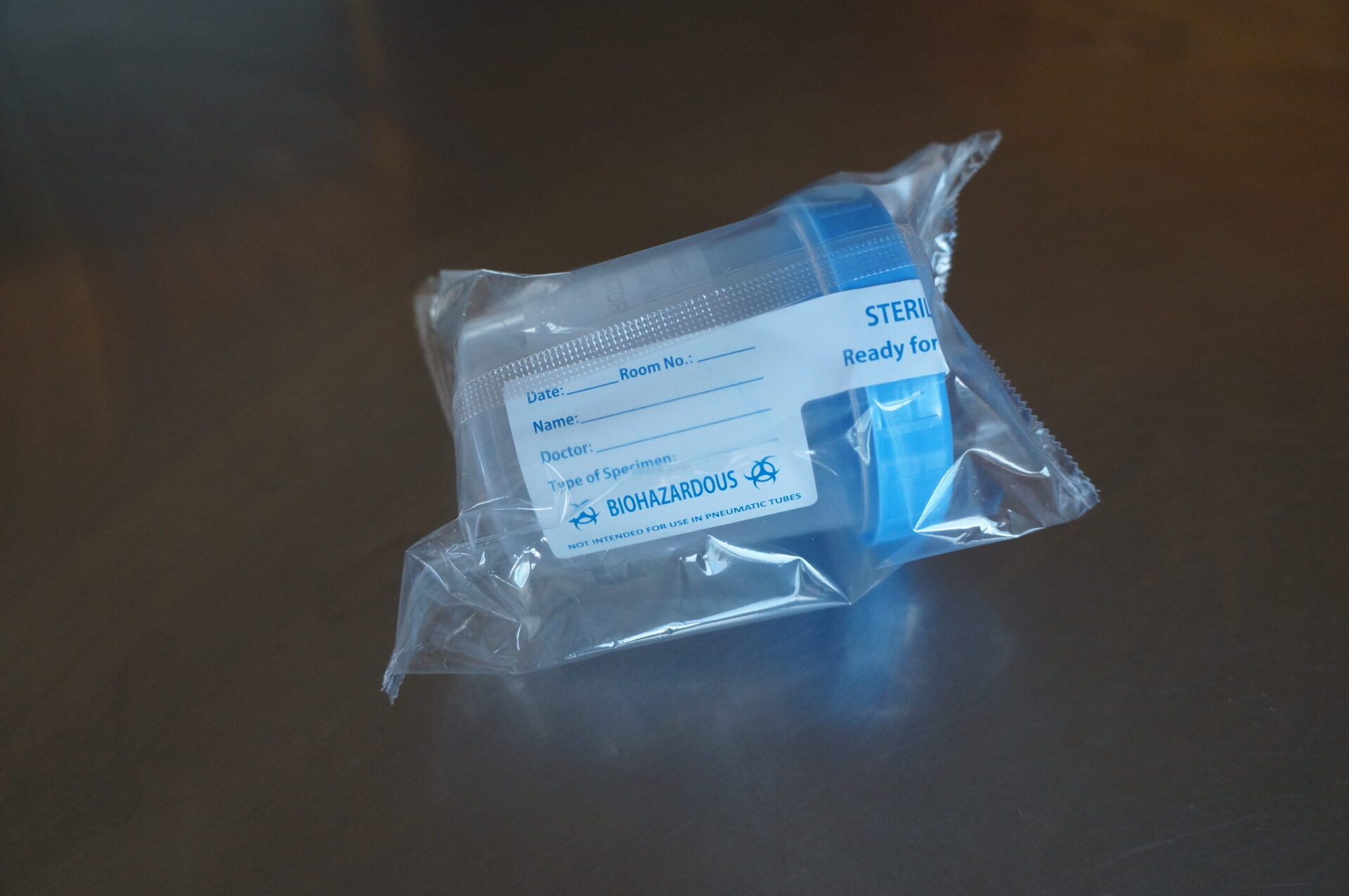 dog urine sample mistake 2 -- solution photo - sterile specimen cup