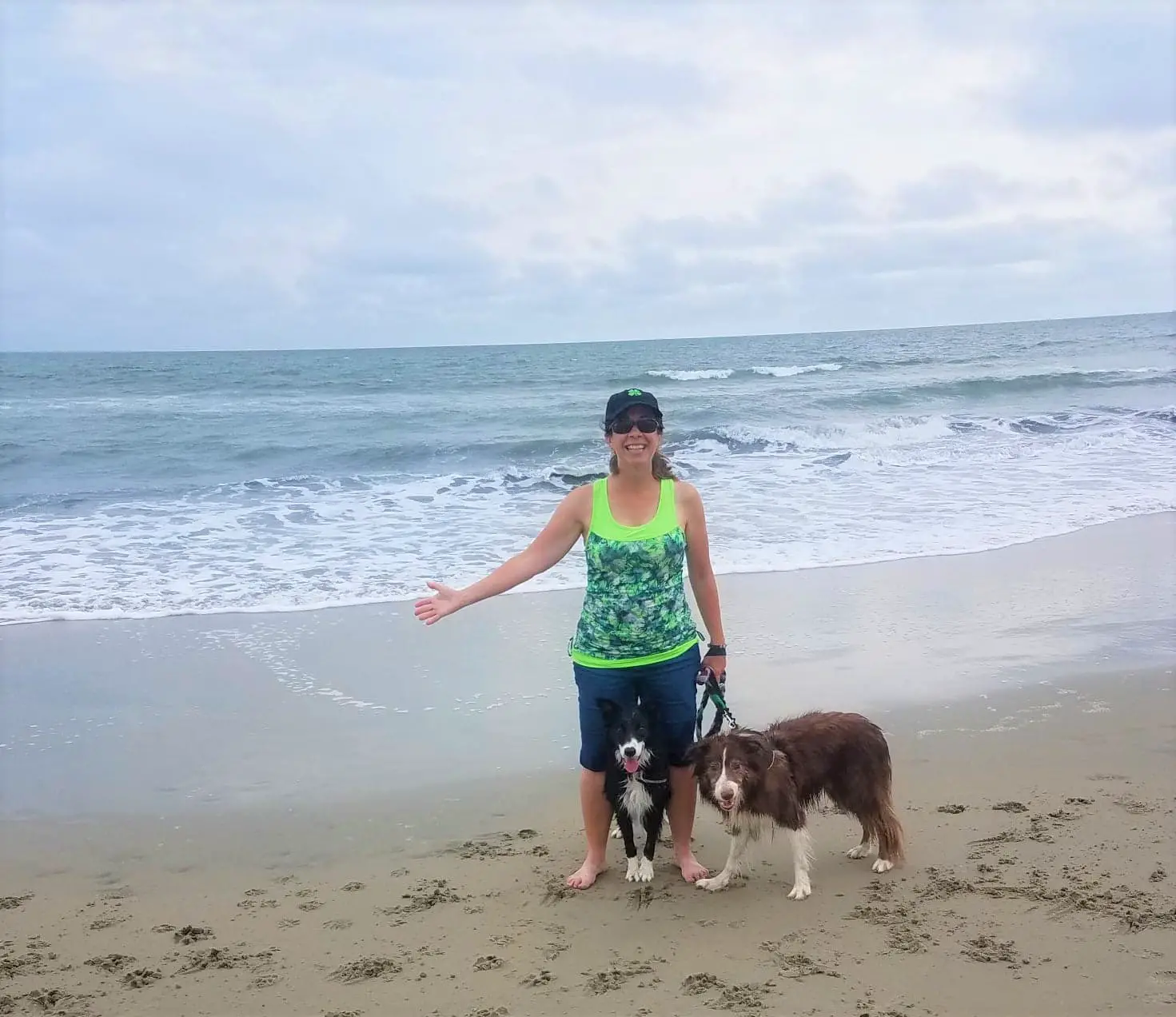 rox on the beach in VA with Clover's littermate speedy between my feet in 2019